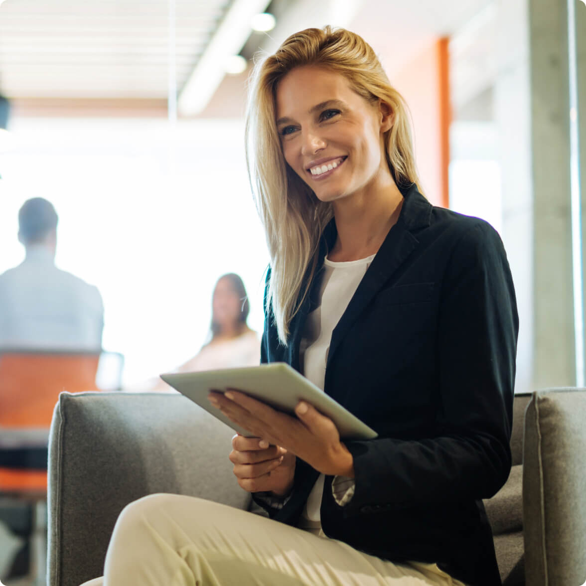 A woman in a meeting about how easily you can automate your business processes.